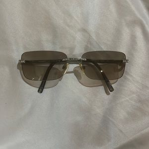Chic Chanel Sunglasses with Stone Detailing.